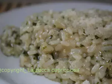 Ricetta Risotto parmigiano con pesto basilico e piselli