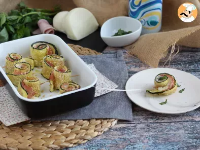 Ricetta Involtini di zucchine al forno con prosciutto cotto e scamorza