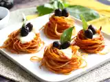 Ricetta Nidi di pasta al forno, un primo piatto sfizioso e facilissimo da preparare