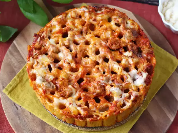 La pasta al forno scenografica della domenica che al taglio scatena un'immediata e irresistibile fame