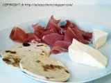 Ricetta Piadine, speck e stracchino fresco