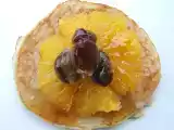 Ricetta Blinis dolci con arance e uvetta caramellate
