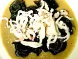 Ricetta Plin di capra su crema di carciofi con calamari scottati