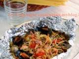 Ricetta Spaghetti con frutti di mare al cartoccio