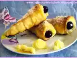 Ricetta Coni di pasta sfoglia ripieni di crema pasticcera