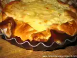 Ricetta Torta salata con porro, cipolla rossa, speck, crescenza e taleggio