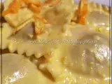 Ricetta Ravioli di brasato con crema all arancia