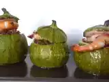Ricetta Zucchine tonde ripiene di riso venere rosso e mazzancolle