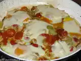 Ricetta Uova con cipolle e pomodori