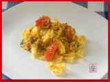 Ricetta Tagliatelle ricce con pancetta e verdure