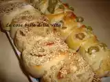 Ricetta Rose di pane alle olive e al prosciutto
