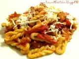 Ricetta Lorighittas con salsiccia, peperoni e ricotta salata