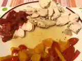 Ricetta Petto di pollo al forno con peperoni e pomodori