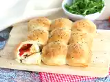 Ricetta Fagottini di pizza con prosciutto cotto e formaggio