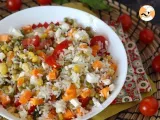 Ricetta Insalata di riso vegetariana: feta, mais, carote, piselli, pomodorini e menta