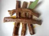Ricetta Tagliatelle alla liquirizia farcite con persico in salsa alle clementine