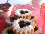 Ricetta Biscotti alle nocciole farciti con marmellata di lamponi