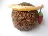 Ricetta Cupola di riso rosso selvatico con cicorie selvatiche e nastri di seppie