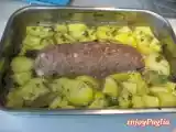 Ricetta Polpettone ripieno di prosciutto cotto e mozzarella con patate al forno