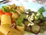 Ricetta Paccheri con calamari e melanzane trifolate