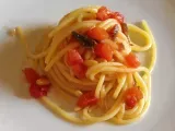 Ricetta Spaghetti al profumo di aringa e pinoli.