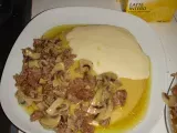 Ricetta Polenta con formaggio fuso, funghi e sasiccia