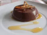 Ricetta budini al cioccolato fondente con salsa di agrumi