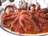 Ricetta Polpo in umido con pane ciabatta alle cipolle e vino rosso