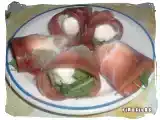 Ricetta Ciliegine di mozzarella con rucola e crudo