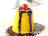 Ricetta Tortino al cocco con salsa al cioccolato e rum
