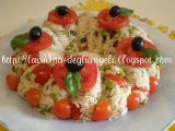 Ricetta Corona di riso basmati, salmone, olive e piselli