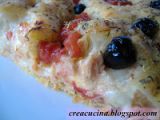 Ricetta Focaccia farcita al tonno con olive nere e pomodorini