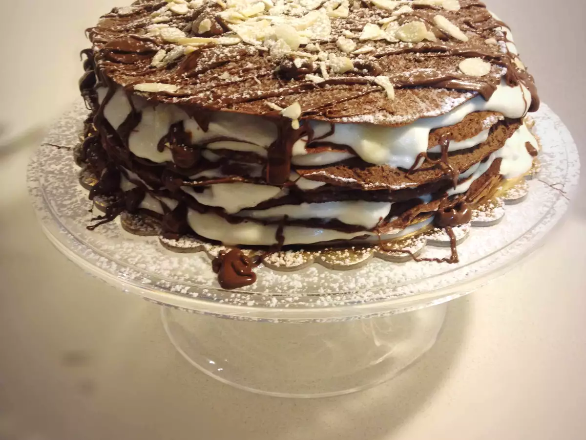 Ricetta Torta di crepes al cacao con crema diplomatica, la golosissima ricetta senza glutine