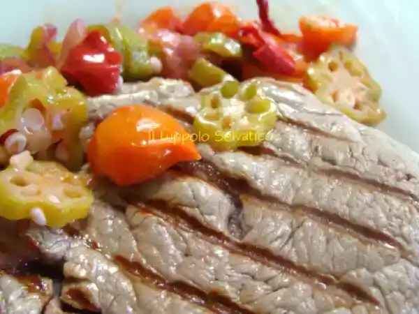 Ricetta Okra, pomodorini e cipolla