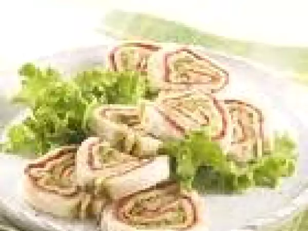 Ricetta Rotolo di mozzarella farcito con speck e rucola
