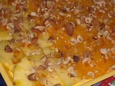 Ricetta Ananas e arancia con miele e frutta secca
