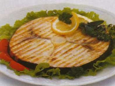 Ricetta Tranci di pesce spada, con pomodorini e peperoncini.