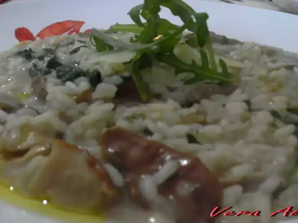 Ricetta Risotto con funghi porcini, rucola e grana