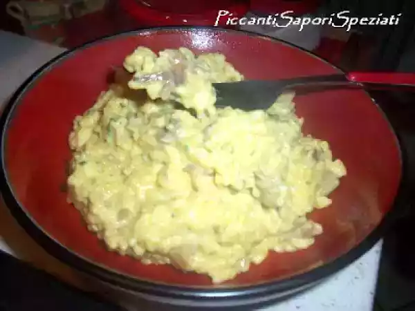 Ricetta Un giallo risotto di funghi pleurotus e pancetta mantecato al mascarpone