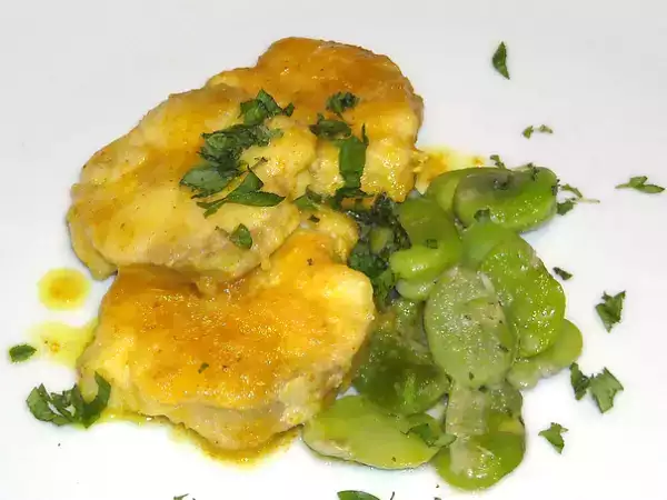 Ricetta Spinarolo al curry con fave in umido.