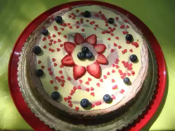 Ricetta Cheesecake marmorizzata ai mirtilli e fragole