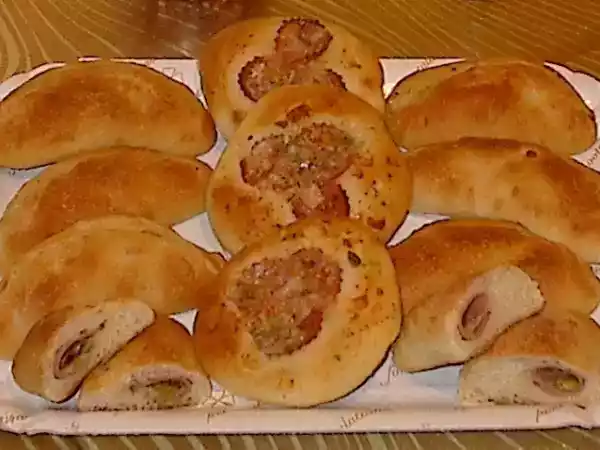 Ricetta Pizzette e calzoncini al forno