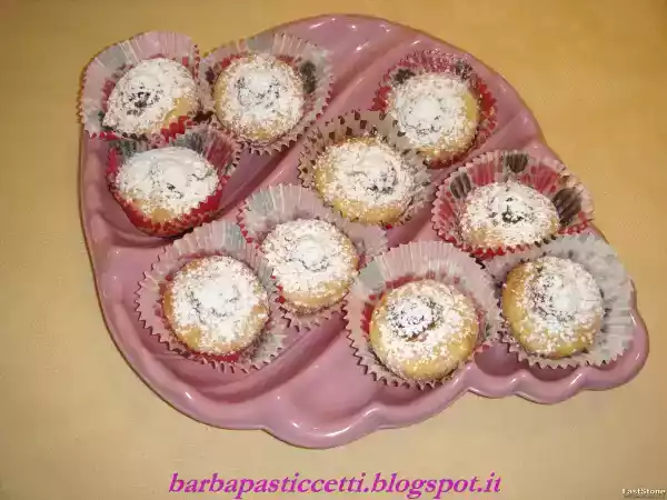 Ricetta Muffins al cocco ripieni di cioccolatini raffaello!