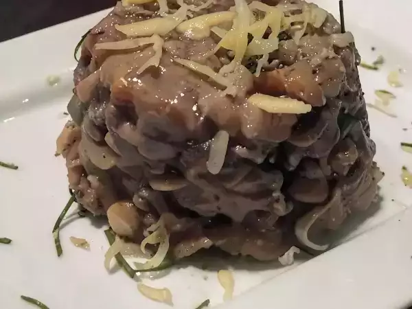 Ricetta Risotto al vino rosso, parmigiano e rosmarino