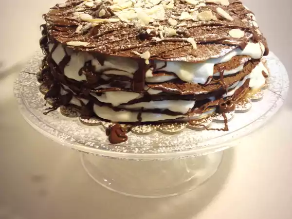 Ricetta Torta di crepes al cacao con crema diplomatica, la golosissima ricetta senza glutine