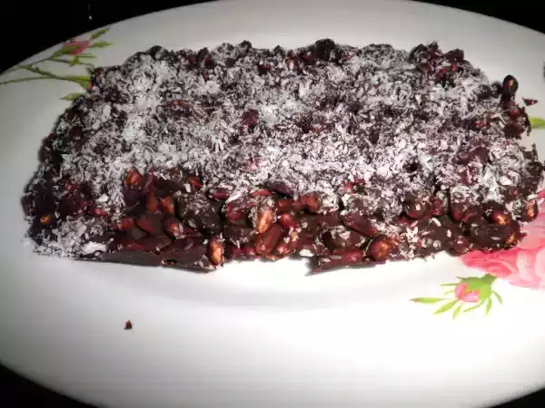 Ricetta Barretta di cioccolato con riso soffiato uvetta e cocco