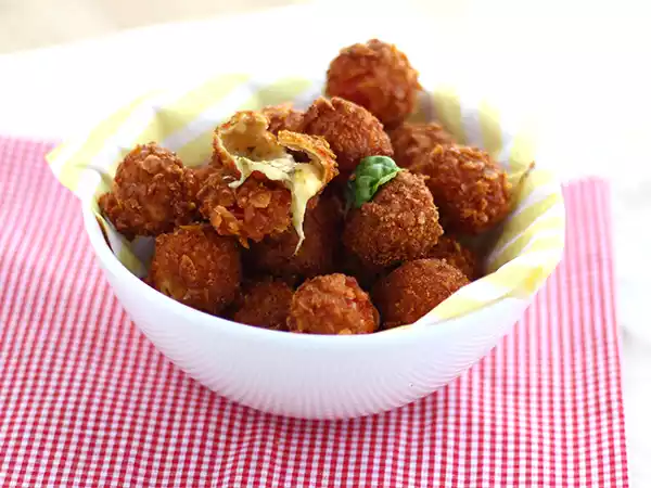 Ricetta Pomodorini impanati, la ricetta croccante per i vostri aperitivi!