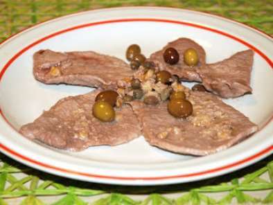 Ricetta Fettine di scottona con olive taggiasche, capperi e noci