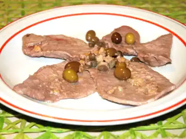 Ricetta Fettine di scottona con olive taggiasche, capperi e noci