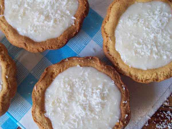 Ricetta Tartellettes cocco e banana con frolla all'olio e miele